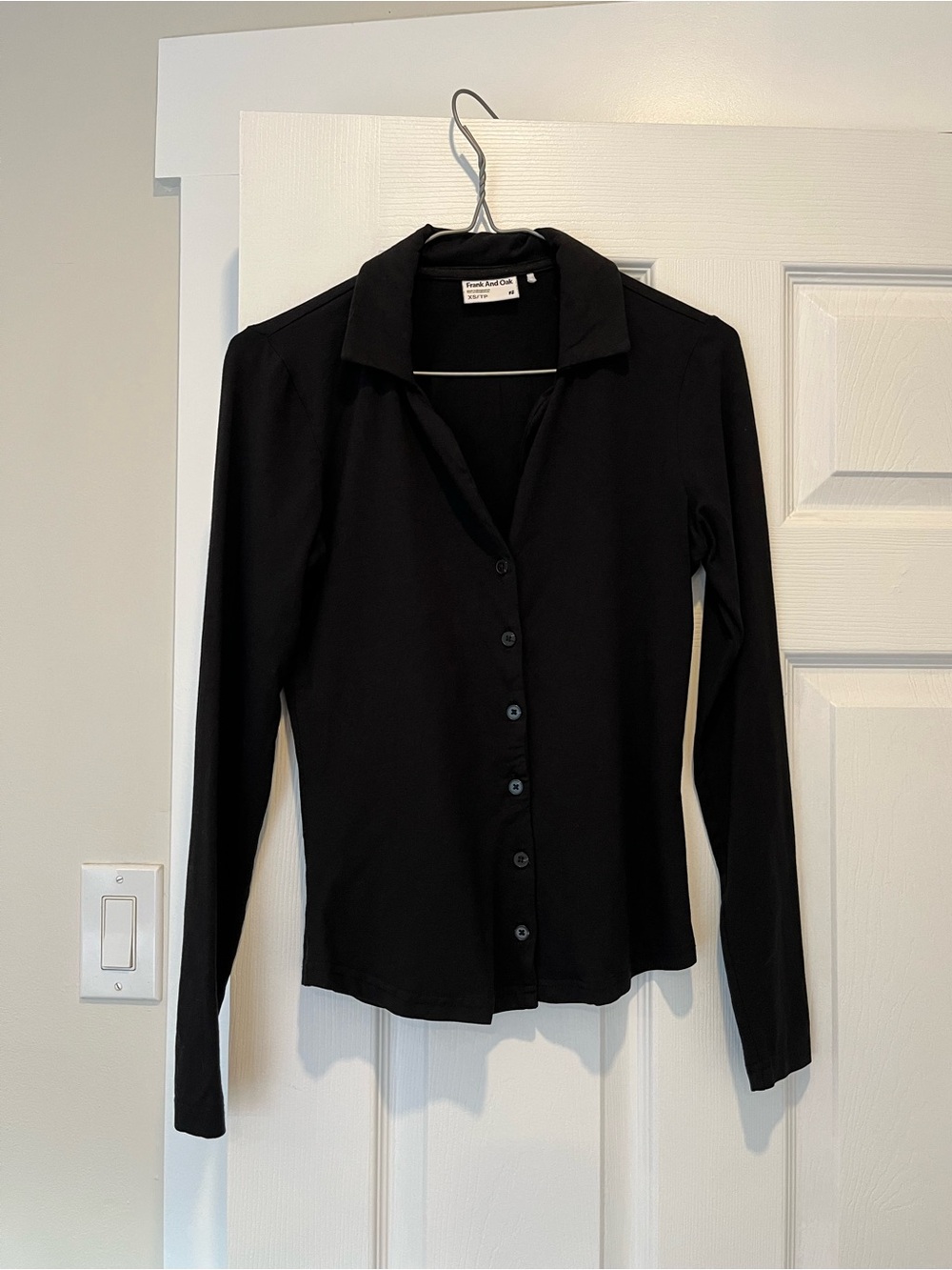 Stretchy black button down
